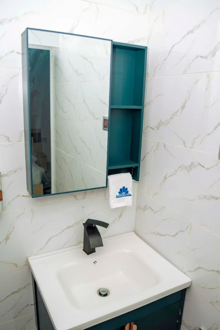 Bathroom vanity with mirror cabinet at Skycity Hotel