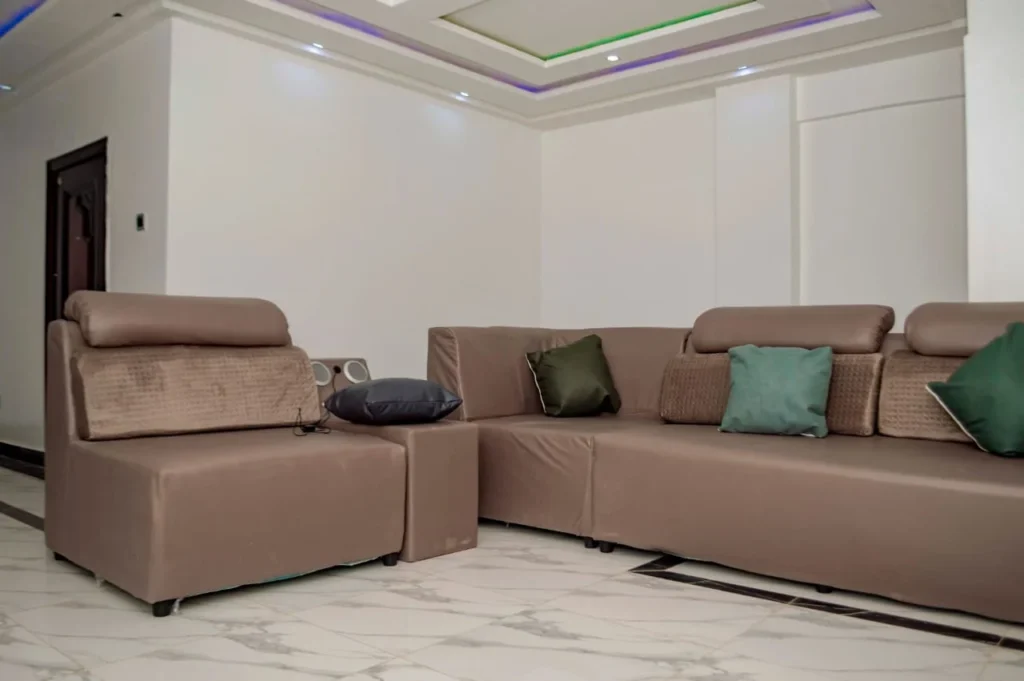Chalet living area with large sectional sofa at Skycity Hotel