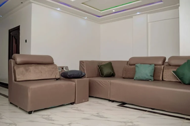 Chalet living area with large sectional sofa at Skycity Hotel