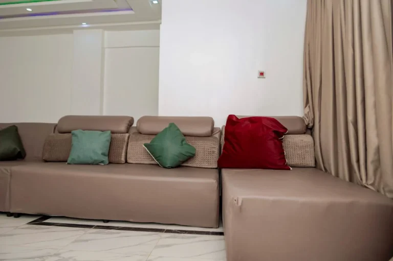 Sectional sofa with cushions in a Skycity Hotel chalet