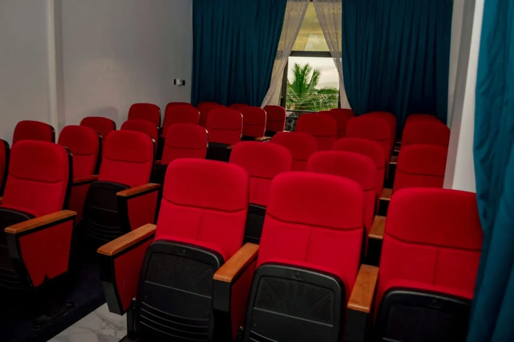 Rows of red conference seats at Skycity Hotel, Amrahia