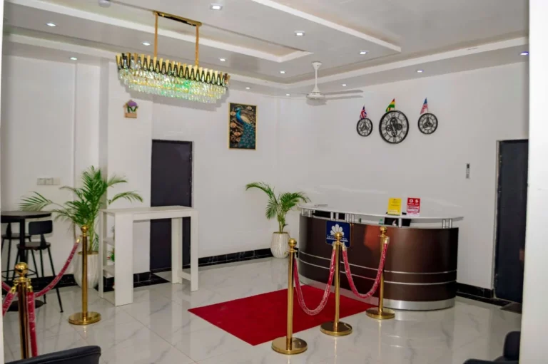 Hotel lobby with crystal chandelier and reception at Skycity Hotel