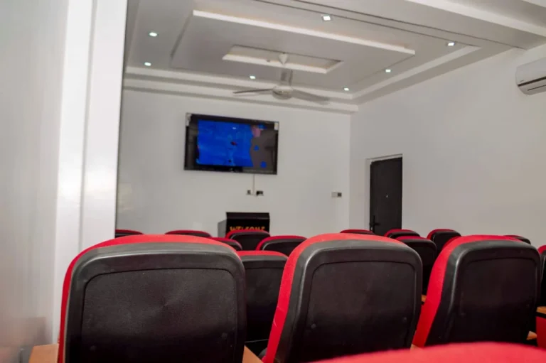 Conference room with wall-mounted screen at Skycity Hotel