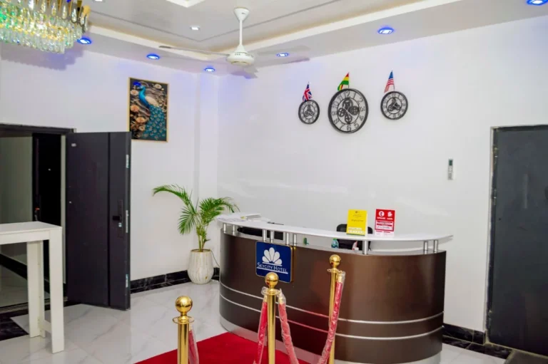 Reception desk with red carpet welcome at Skycity Hotel