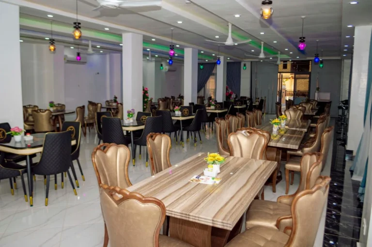Bright restaurant interior with pendant lights at Skycity Hotel