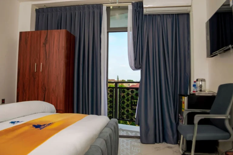 Hotel room opening onto a balcony at Skycity Hotel